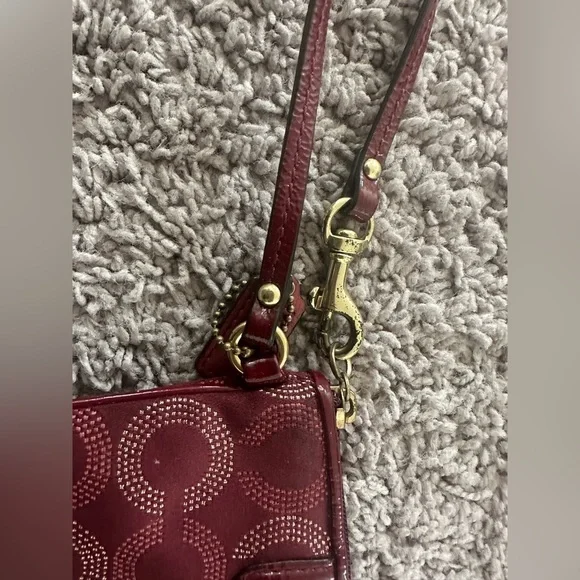 Preloved Coach Maroon Wristlet with Circular Design - Picture 4 of 5